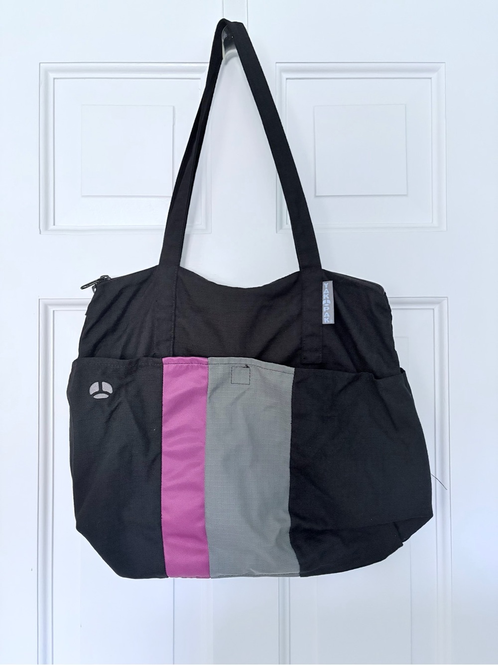 Black Tote Bag with Stripes and Zipper Closure
